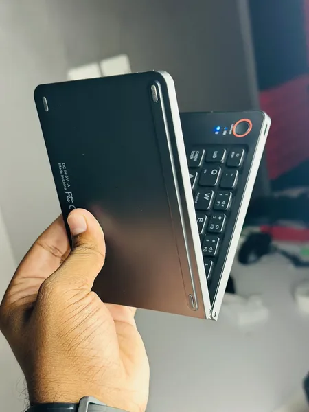 Rechargeable Folding Bluetooth Keyboard ছবি 3 - ElevateMart